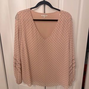 Pink v-neck top with sheer sleeve detail